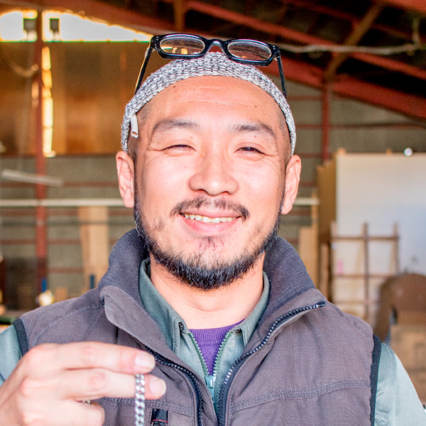 福地源一郎<br>
生産部課長